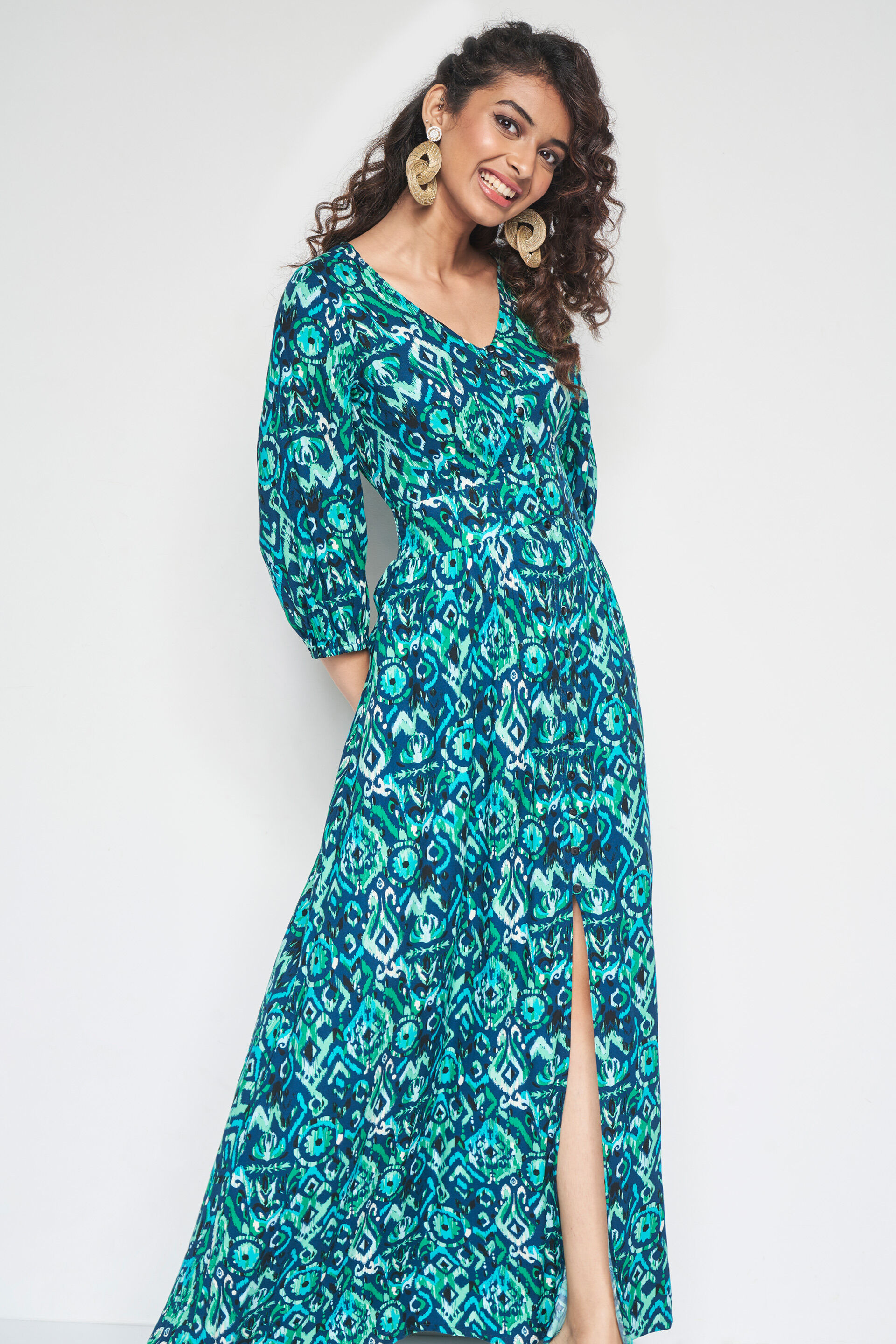 Buy our Teal Bohemian Flared Maxi online from globaldesi.in SC FW23GA211MXRY
