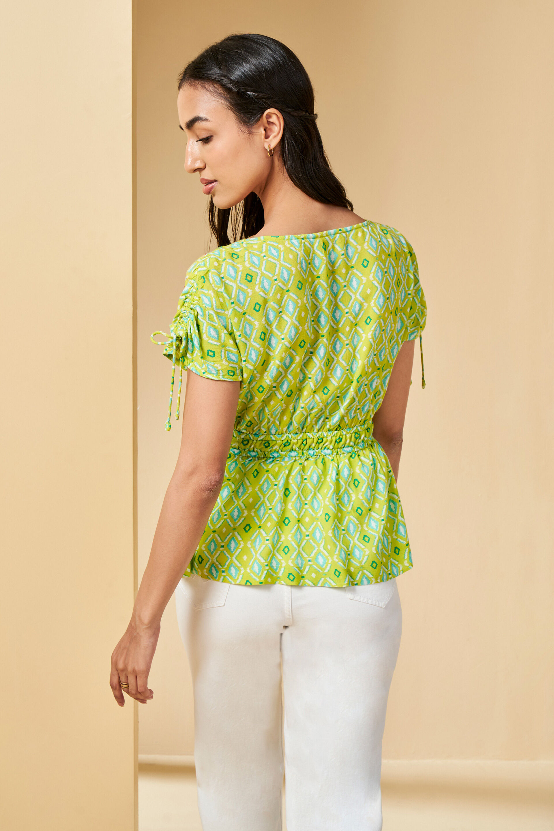 Buy Lime n' Peplum Top Online for Women from Globaldesi