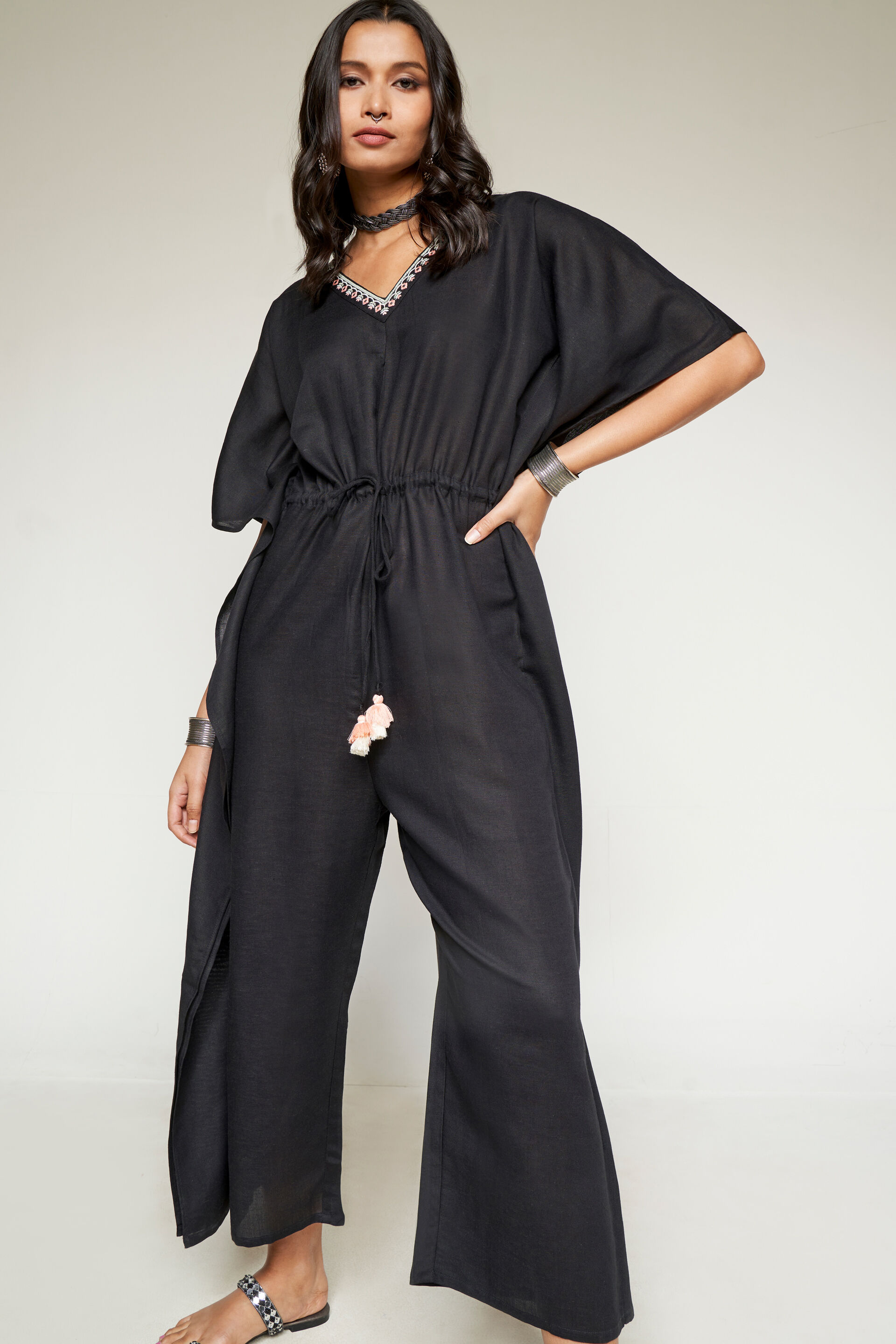 Black jumpsuit with golden embellishment – Looks By Aswani