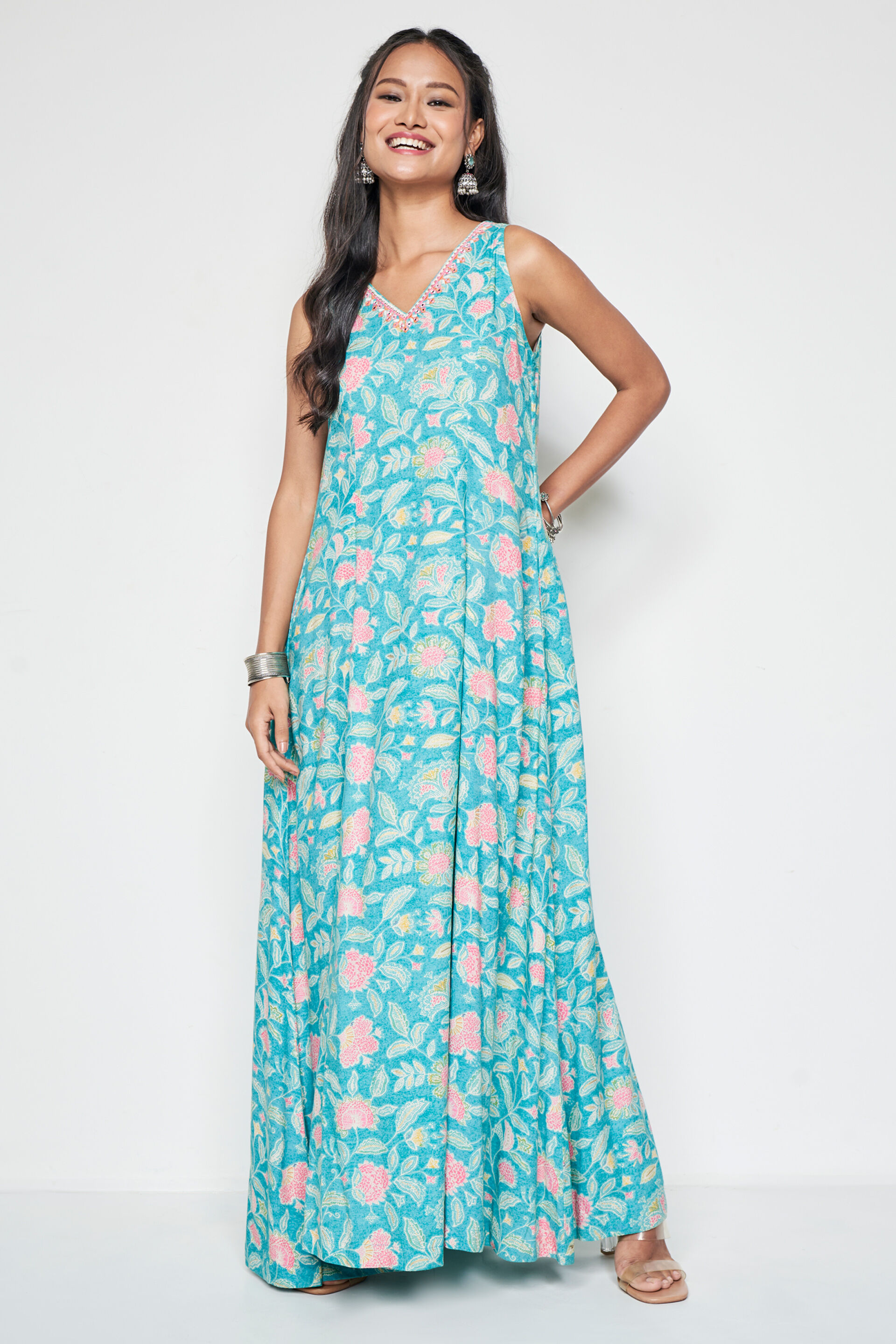 Buy our Aqua Floral Flared Maxi online from globaldesi.in SC FW23GA185MXRY